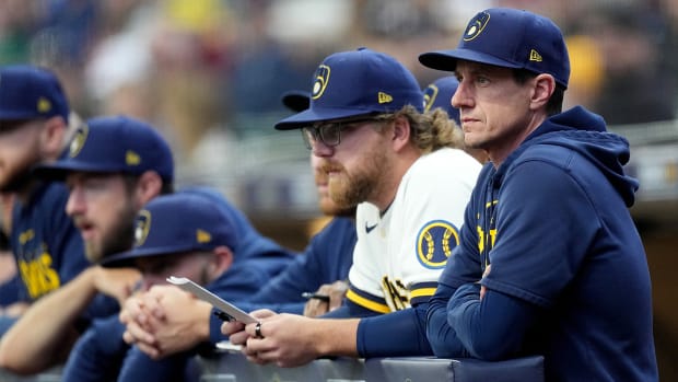 Craig Counsell watches on as the Brewers play in the National League playoffs.